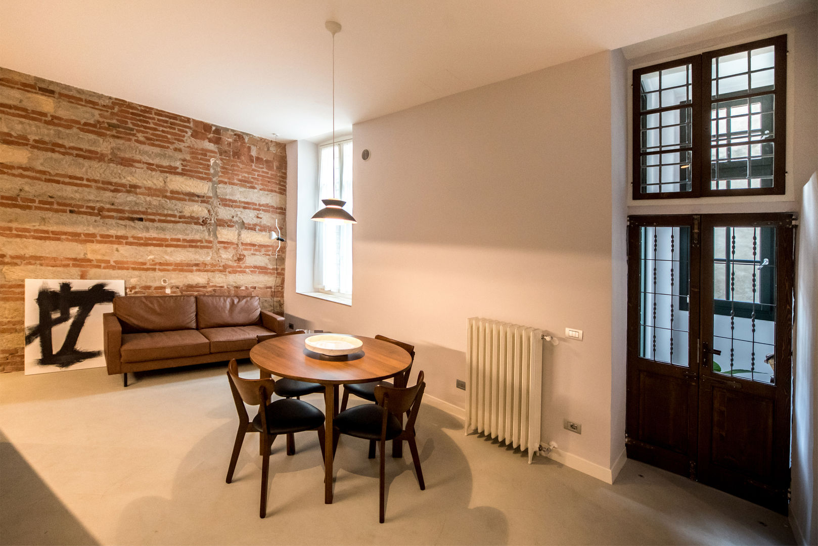 #AMANTI11, PADIGLIONE B PADIGLIONE B Living room Bricks