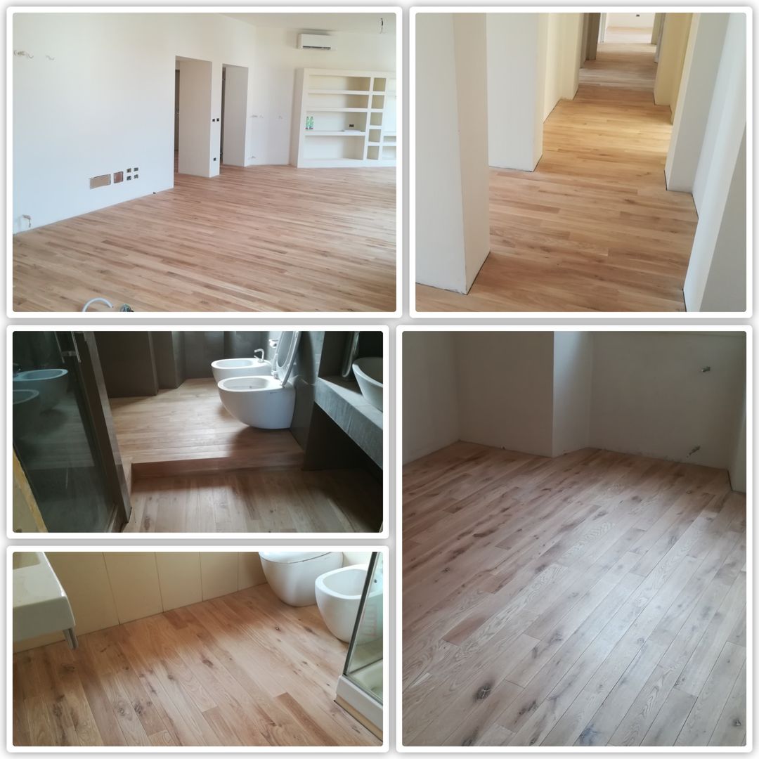 Posa in opera parquet in rovere incluso ripristino del sottofondo, Soloparquet Srl Soloparquet Srl Salas de estilo clásico Madera maciza Multicolor