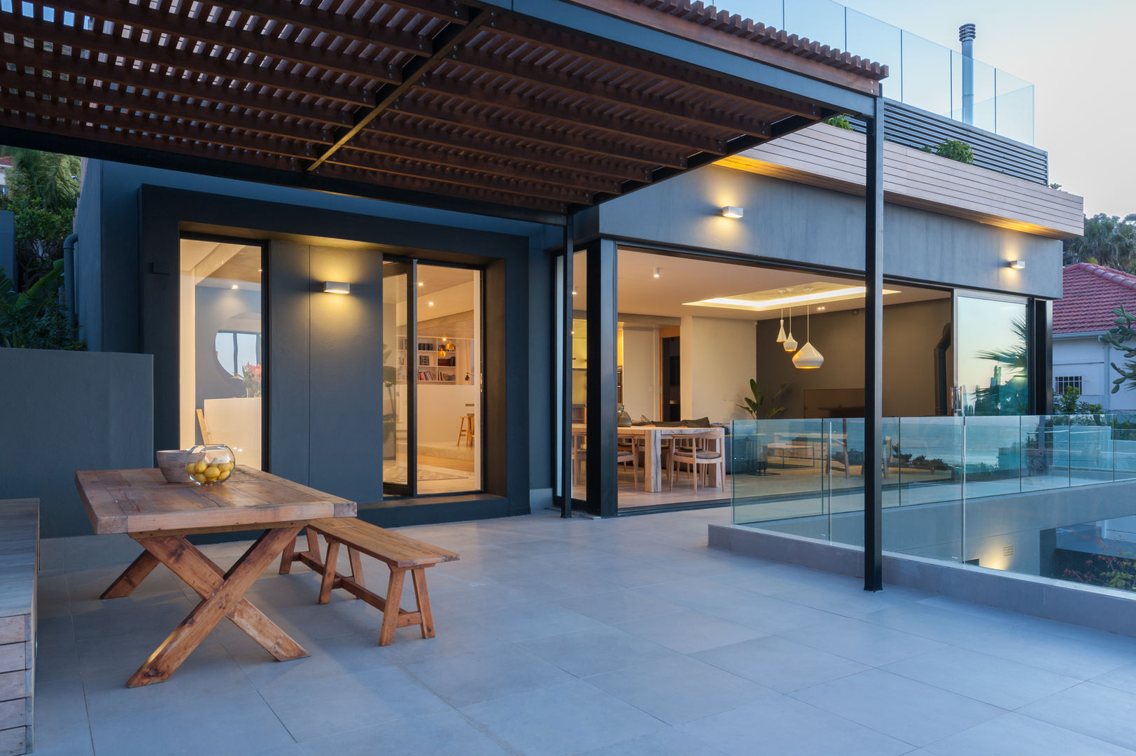 Patio with steel pergola and timber roof JBA Architects Modern balcony, veranda & terrace Iron/Steel