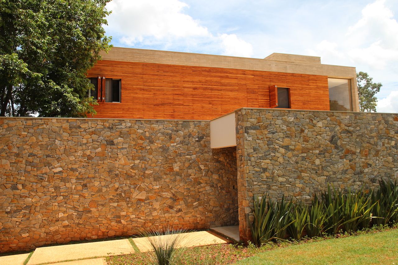 residência mrc, CBR Arquitetura Ltda. CBR Arquitetura Ltda. Detached home لکڑی Wood effect