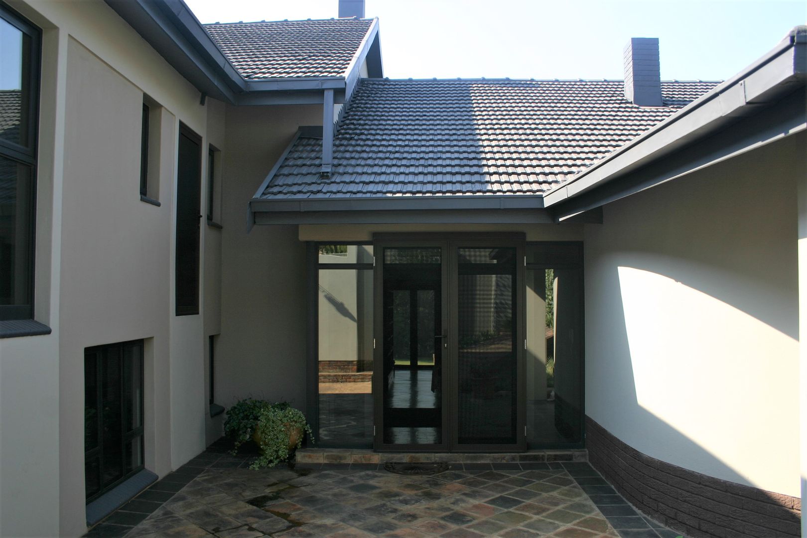 After photo of man entrance of the house Nuclei Lifestyle Design