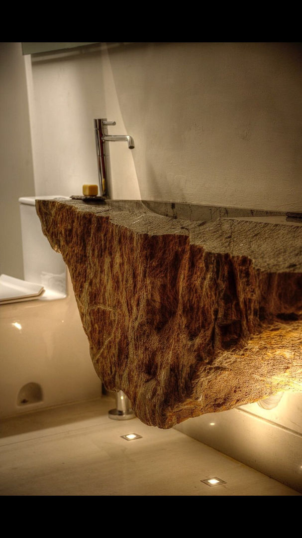 Baño de visitas. Stuen Arquitectos Baños rústicos Piedra ovalin de piedra