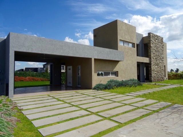 Casa minimalista en San VIcente Estudio Dillon Terzaghi Arquitectura - Pilar Casas unifamiliares Piedra
