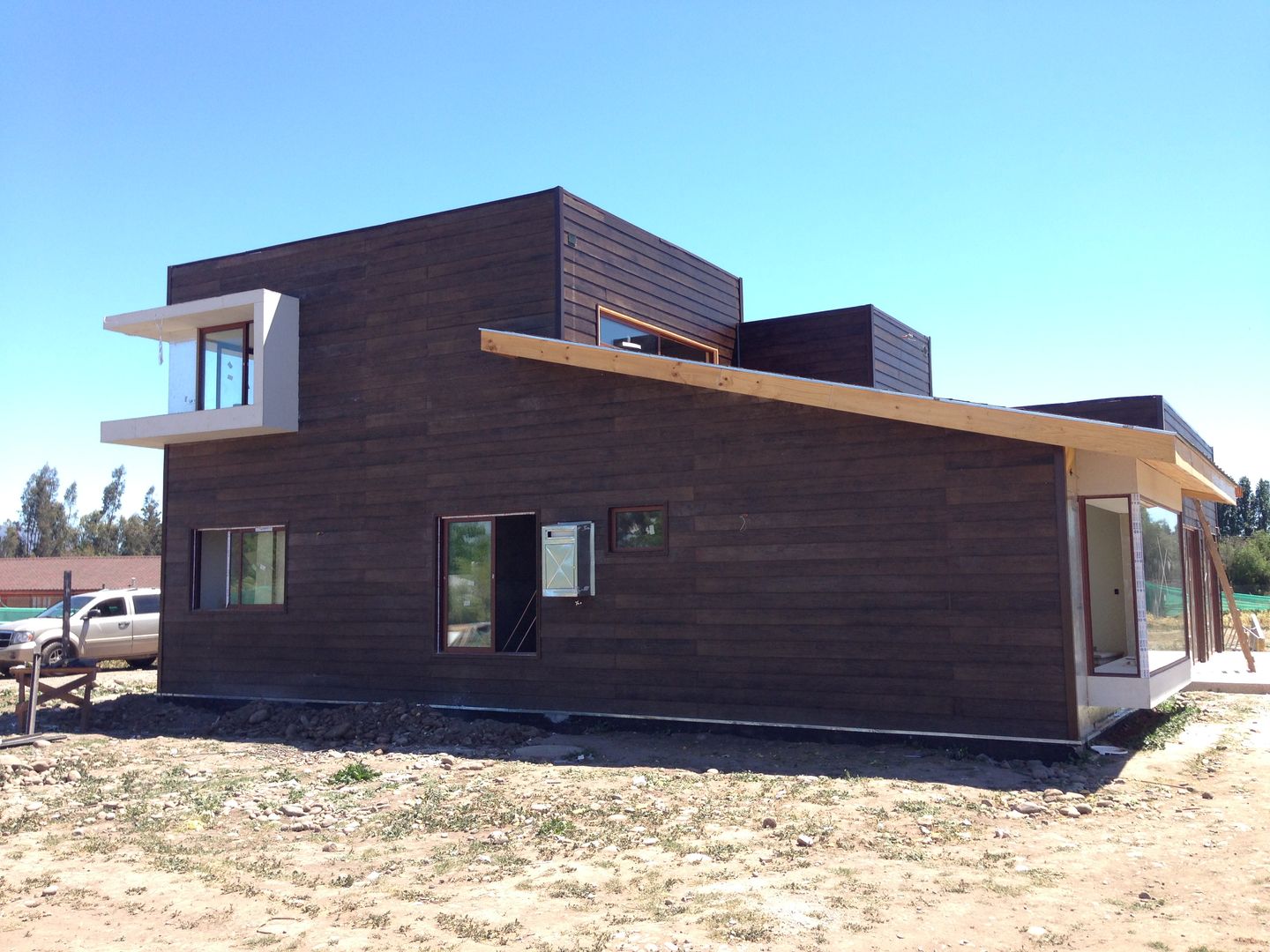 Construcción de Casa Munchmeyer Rumpf por Arqbau, Arqbau Ltda. Arqbau Ltda. Single family home Wood-Plastic Composite