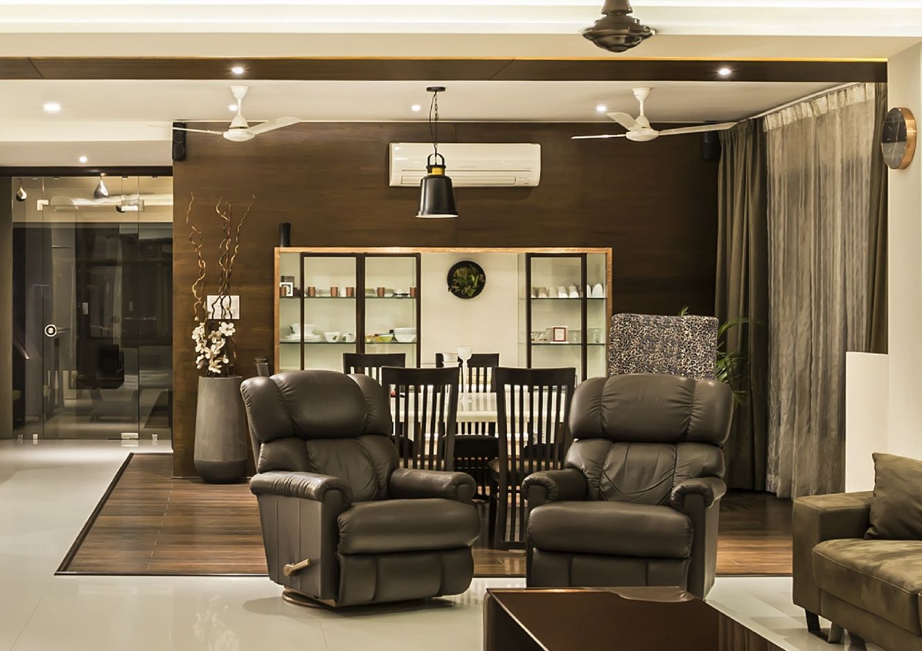 living area and dining area homify Modern living room Leather Grey Sofas & armchairs