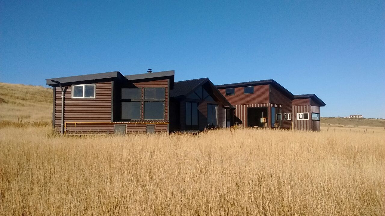 CASA PUERTO NATALES, BE ARQUITECTOS BE ARQUITECTOS منازل