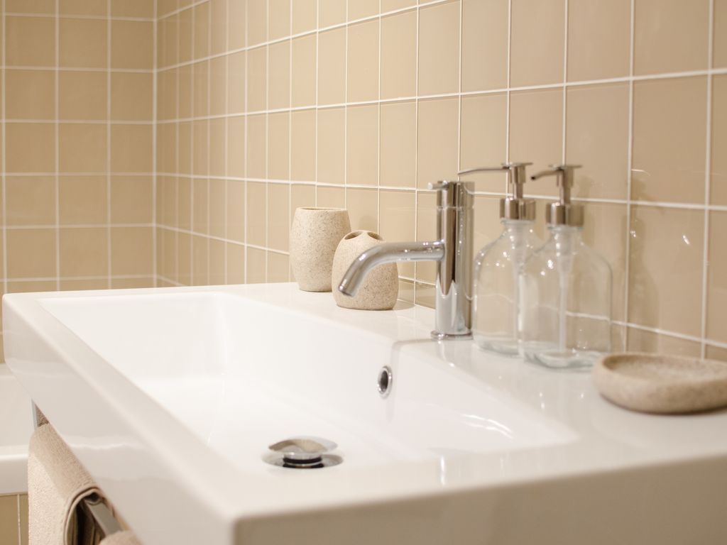 Passeio das Cardosas, Padimat Design+Technic Padimat Design+Technic Modern bathroom Sinks