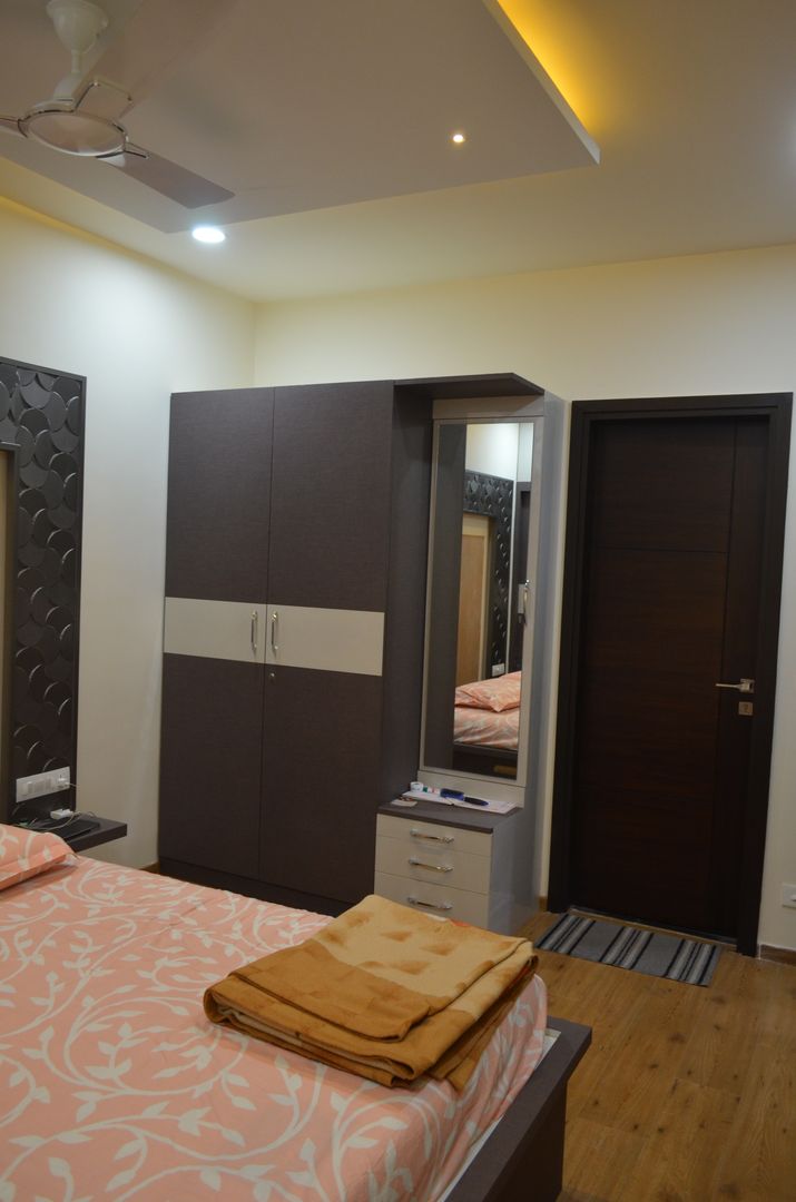 A SUMPTUOUS 3 BHK APARTMENT, Vdezin Interiors Vdezin Interiors Modern Bedroom