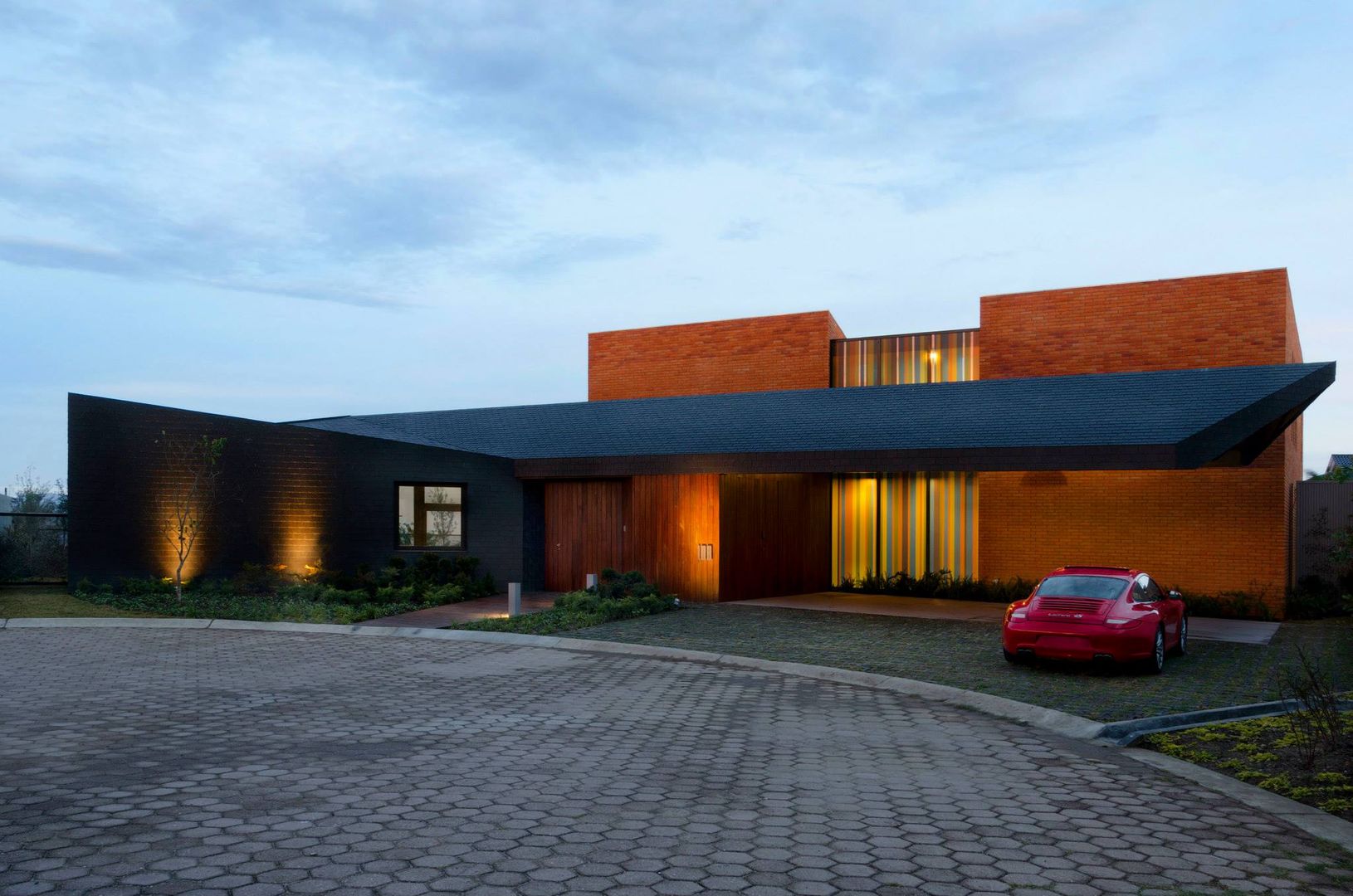 homify Industrial style houses Bricks