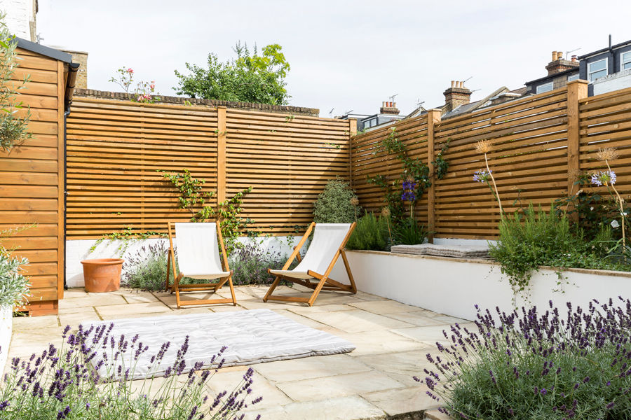 North West London Terraced House, VORBILD Architecture Ltd. VORBILD Architecture Ltd. Vườn phong cách kinh điển Đá sa thạch garden,garden panels,fence,shed,stone tiles,tiled garden