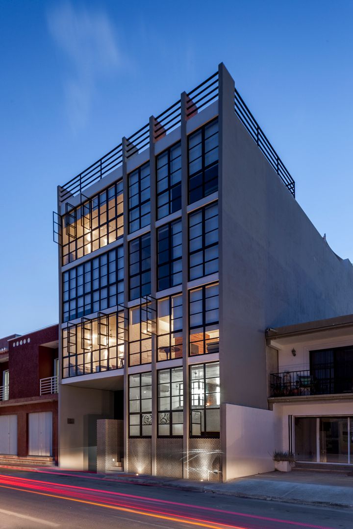 nuove lofts, Daniel Cota Arquitectura | Despacho de arquitectos | Cancún Daniel Cota Arquitectura | Despacho de arquitectos | Cancún บ้านระเบียง กระจกและแก้ว
