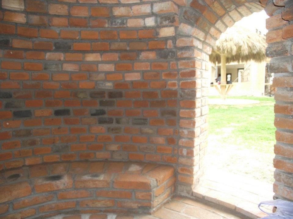 Quinta Providencia, TECTUM Diseño & Construccion TECTUM Diseño & Construccion Colonial style walls & floors Bricks