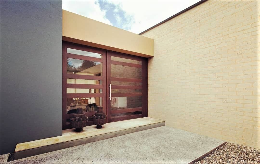 Casa H, David Macias Arquitectura & Urbanismo David Macias Arquitectura & Urbanismo Minimalist style doors