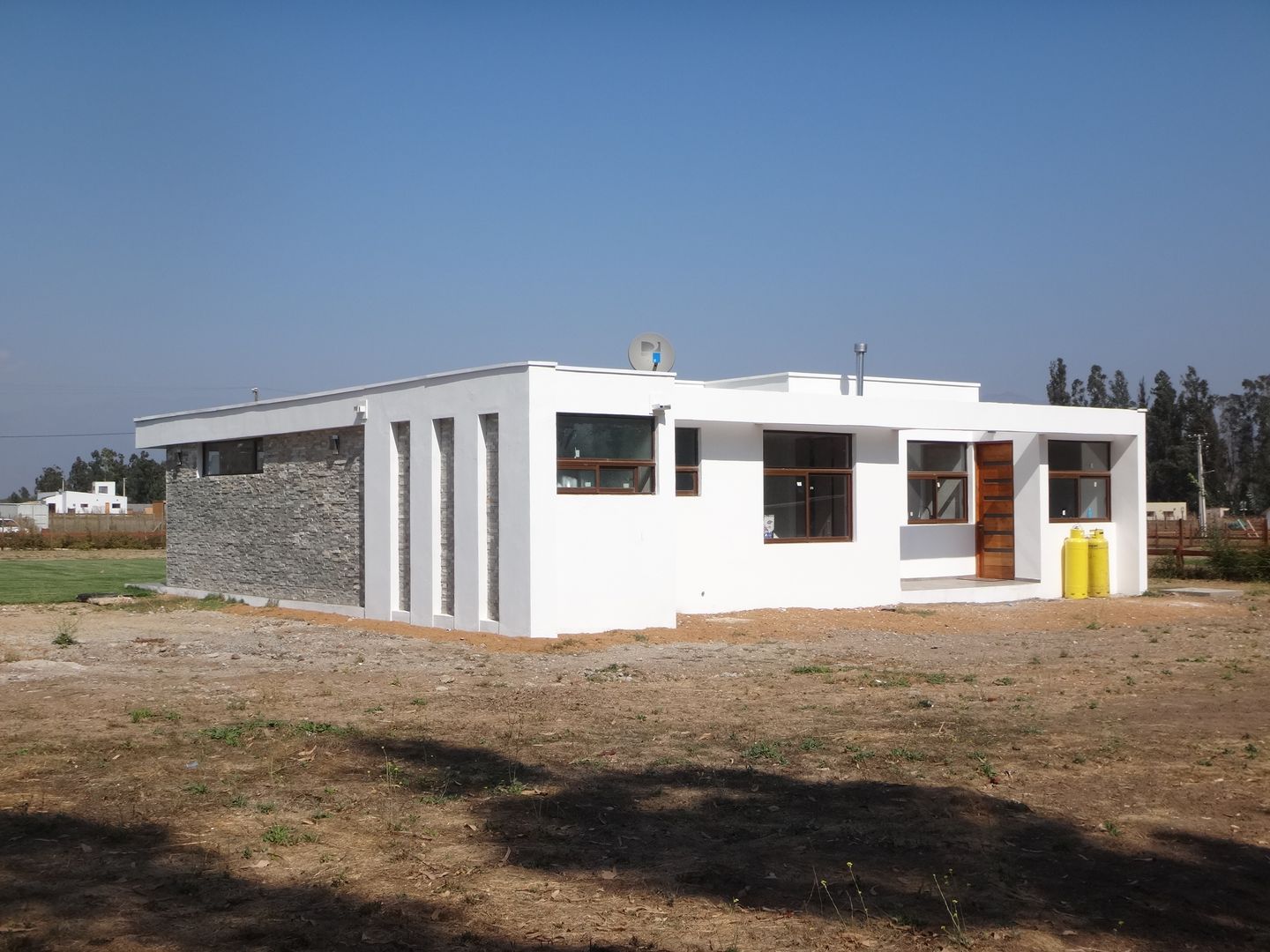 Vivienda Garrido por ARKITEKTURA, ARKITEKTURA ARKITEKTURA Single family home Concrete