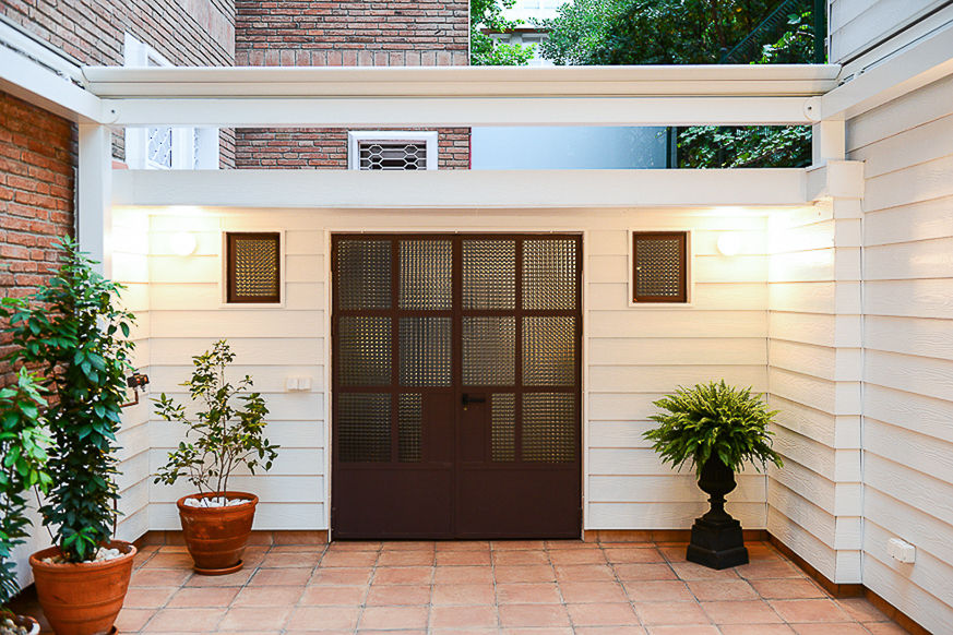 Reforma de una terraza en Barcelona, ETNA STUDIO ETNA STUDIO Jardins modernos Vedações e muros