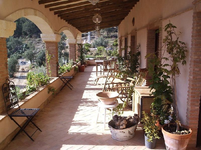 Anne's house, Mirasur Proyectos S.L. Mirasur Proyectos S.L. Country style balcony, veranda & terrace Bricks