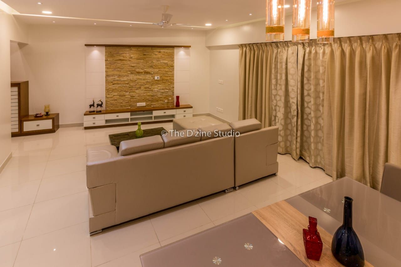 3 bhk complete home interiors in Blue Ridge Township ( Pune) , The D'zine Studio The D'zine Studio Modern living room Table,Building,Lighting,House,Interior design,Houseplant,Curtain,Comfort,Floor,Flooring