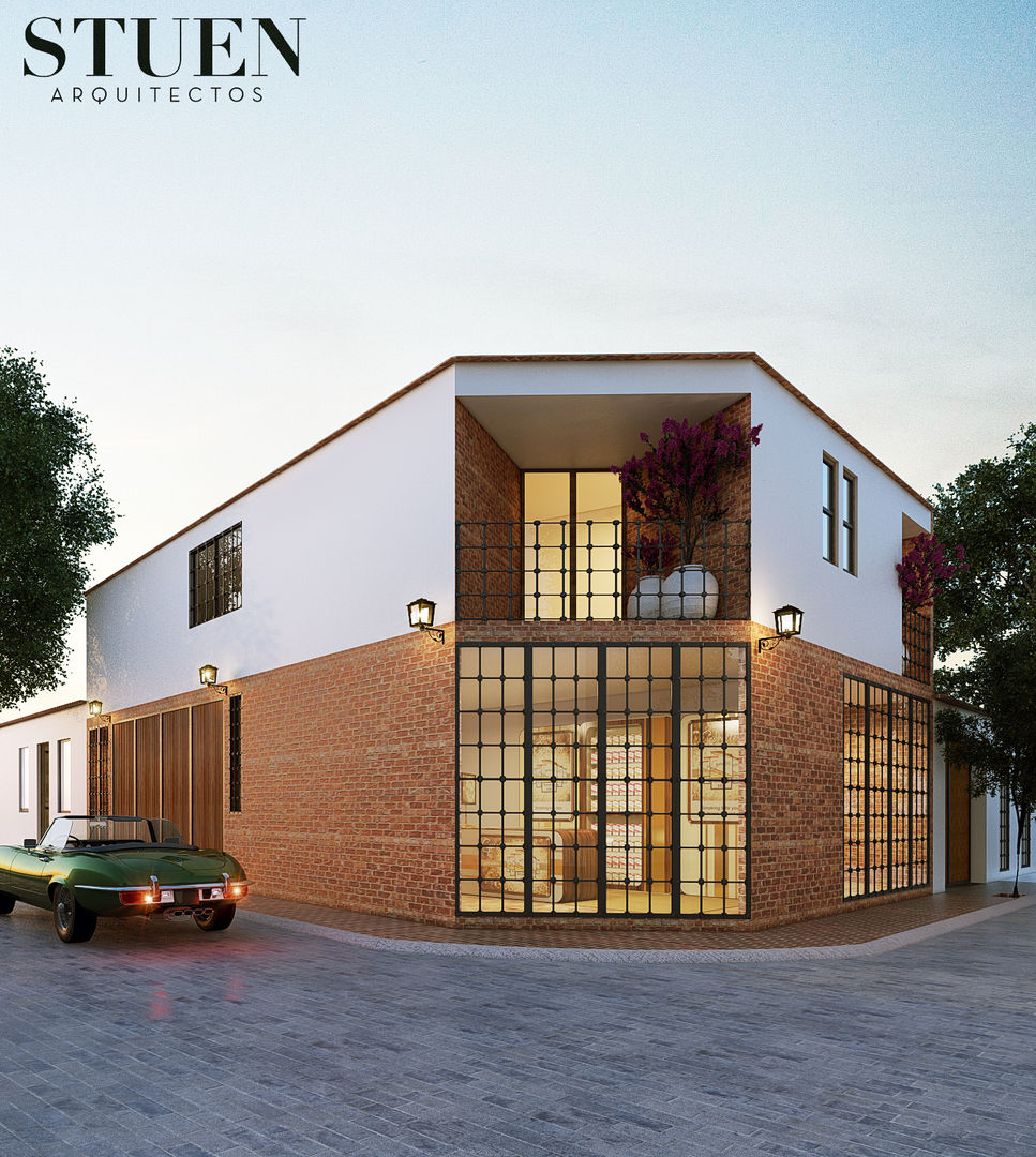 Fachada Frontal Stuen Arquitectos Casas unifamiliares Ladrillos