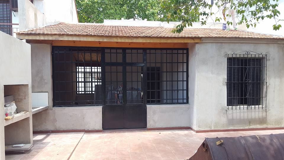 Remodelación de Casa en Florida, Buenos Aires, Laura Avila Arquitecta - Ciudad de Buenos Aires Laura Avila Arquitecta - Ciudad de Buenos Aires Glass doors