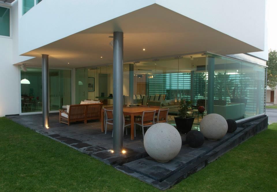 Residencia de lujo en el bajío, TaAG Arquitectura TaAG Arquitectura Casas unifamiliares Concreto