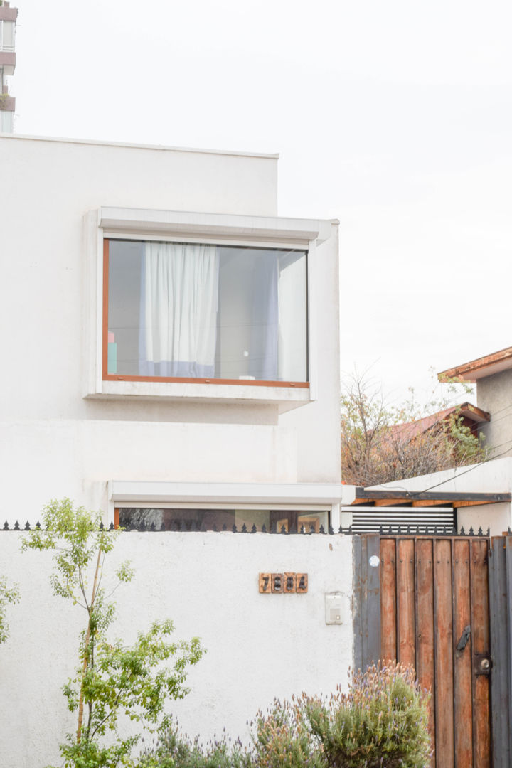 Remodelación de Casa Islas Fidji por Arqbau, Arqbau Ltda. Arqbau Ltda. Finestre in legno