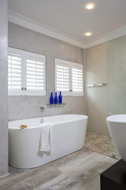 Bathroom Deborah Garth Interior Design International (Pty)Ltd Modern bathroom bathroom floor,bathroom,bath,shutters