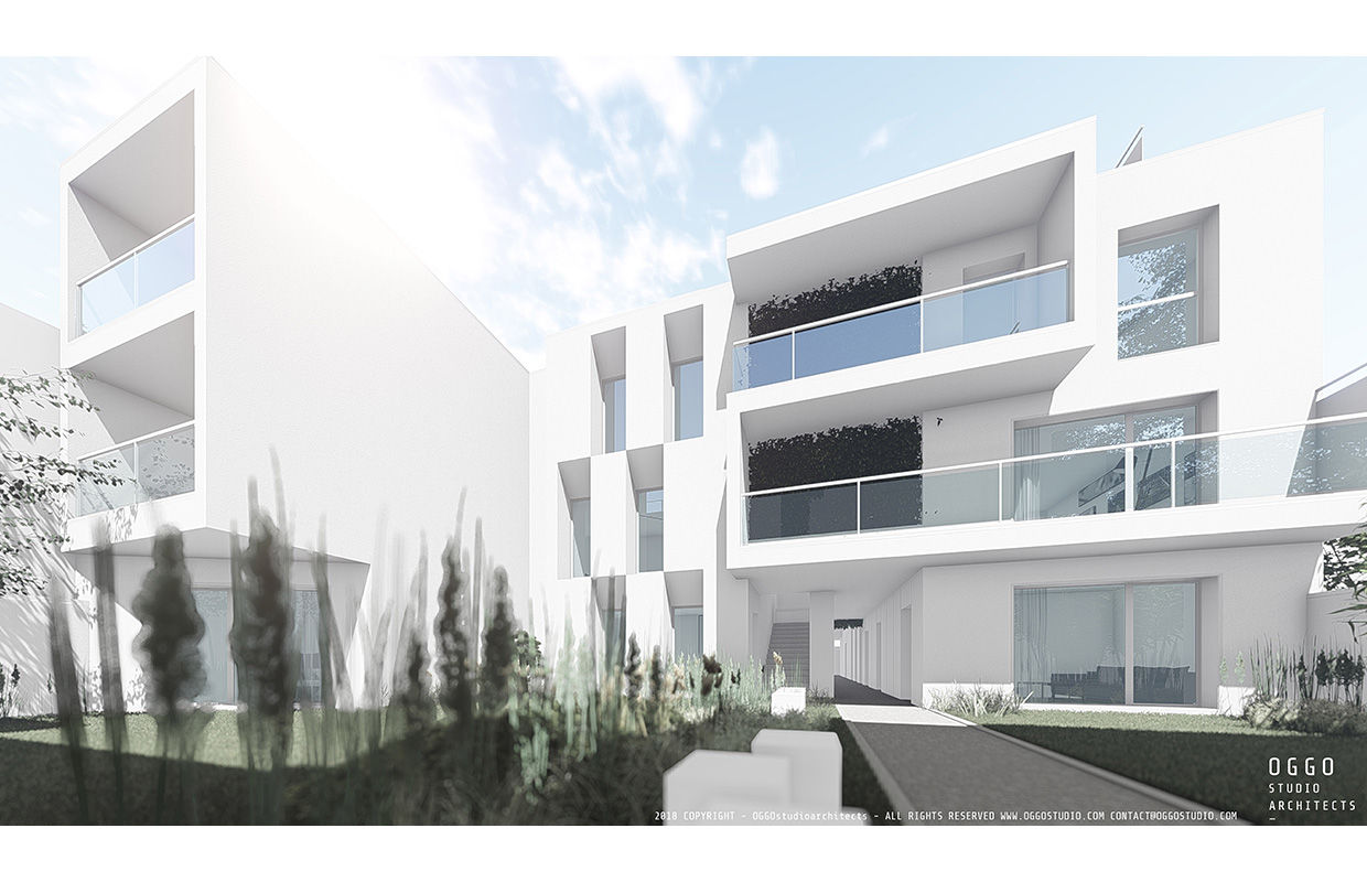 White apartment blocks OGGOstudioarchitects, unipessoal lda Nhà cho nhiều gia đình collective housing,Arago