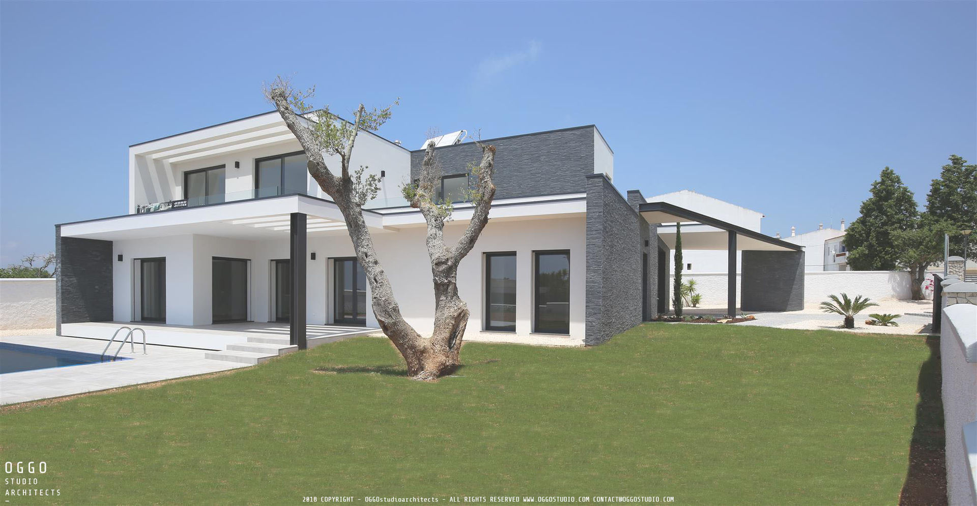 House with a pool and a garden OGGOstudioarchitects, unipessoal lda Casas de estilo minimalista house,garden,Quinta da Bela Vista,Algarve,schist