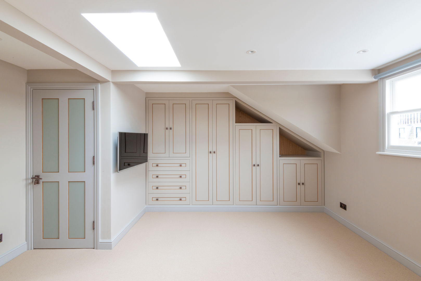 Converted loft bedroom Prestige Architects By Marco Braghiroli Classic style bedroom