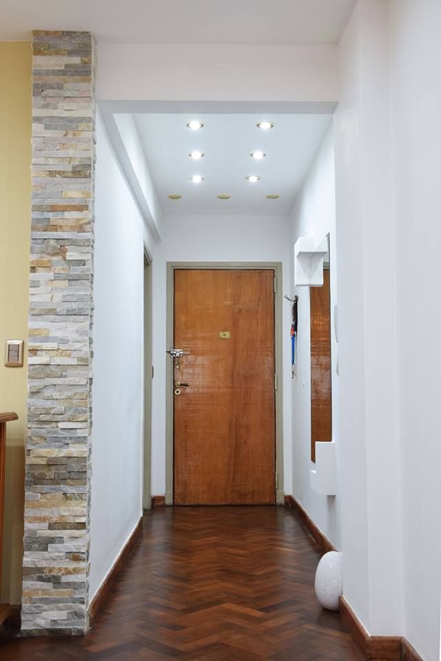 Interiorismo de Living Comedor en Caballito por 3G Arquimundo, Arquimundo 3g - Diseño de Interiores - Ciudad de Buenos Aires Arquimundo 3g - Diseño de Interiores - Ciudad de Buenos Aires Corredores, halls e escadas modernos Iluminação