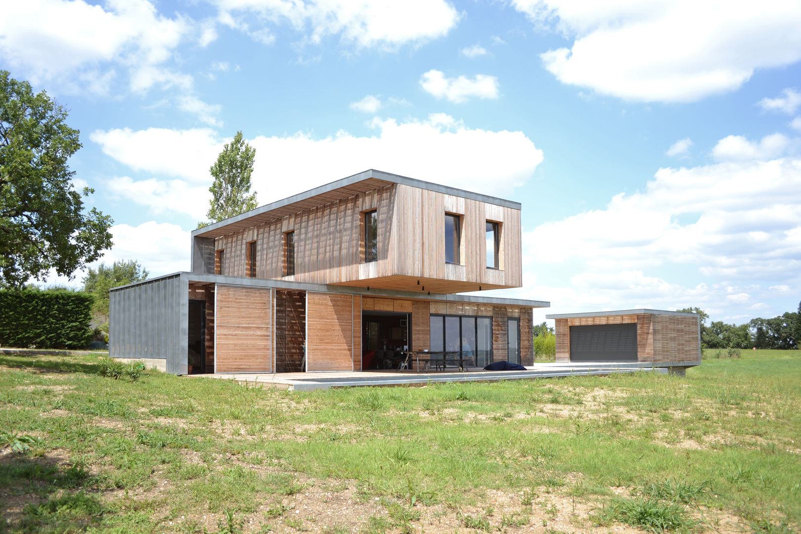 Maison en bois et béton esprit Loft, Créateurs d'Interieur Créateurs d'Interieur 度假別墅 木頭 Wood effect