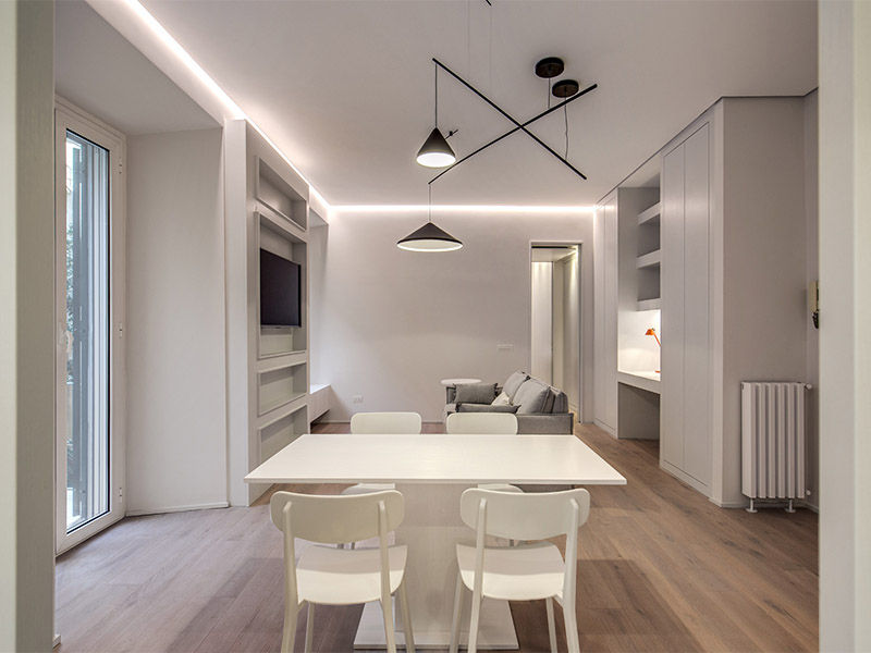 DONIZETTI, MOB ARCHITECTS MOB ARCHITECTS Soggiorno moderno PARQUET,LIBRERIA,TELEVISORE,TAVOLO,LAMPADA,CONTROSOFFITTO