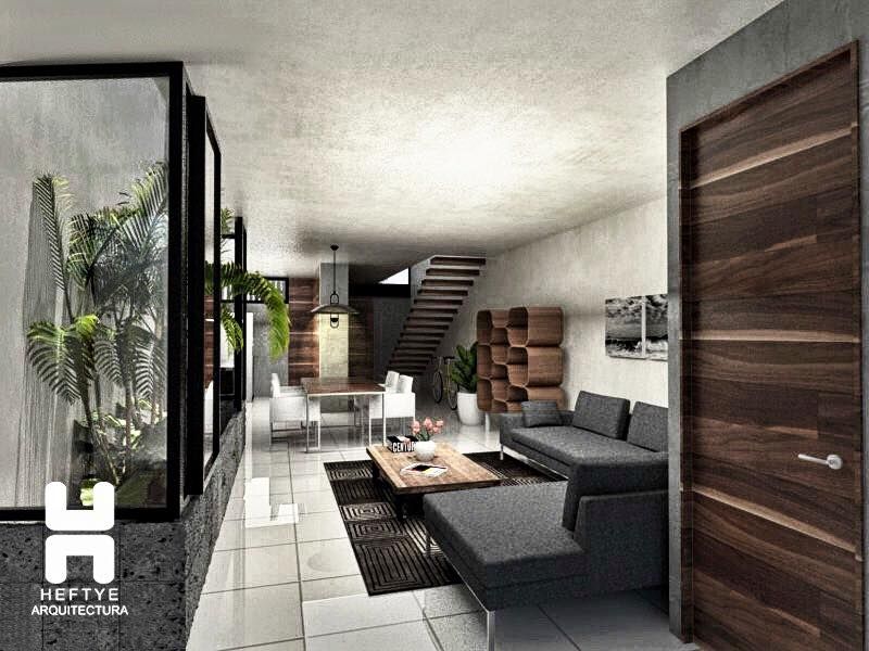 Proyecto de casa habitación diseñada en Mérida, Heftye Arquitectura Heftye Arquitectura Nowoczesny salon Beton