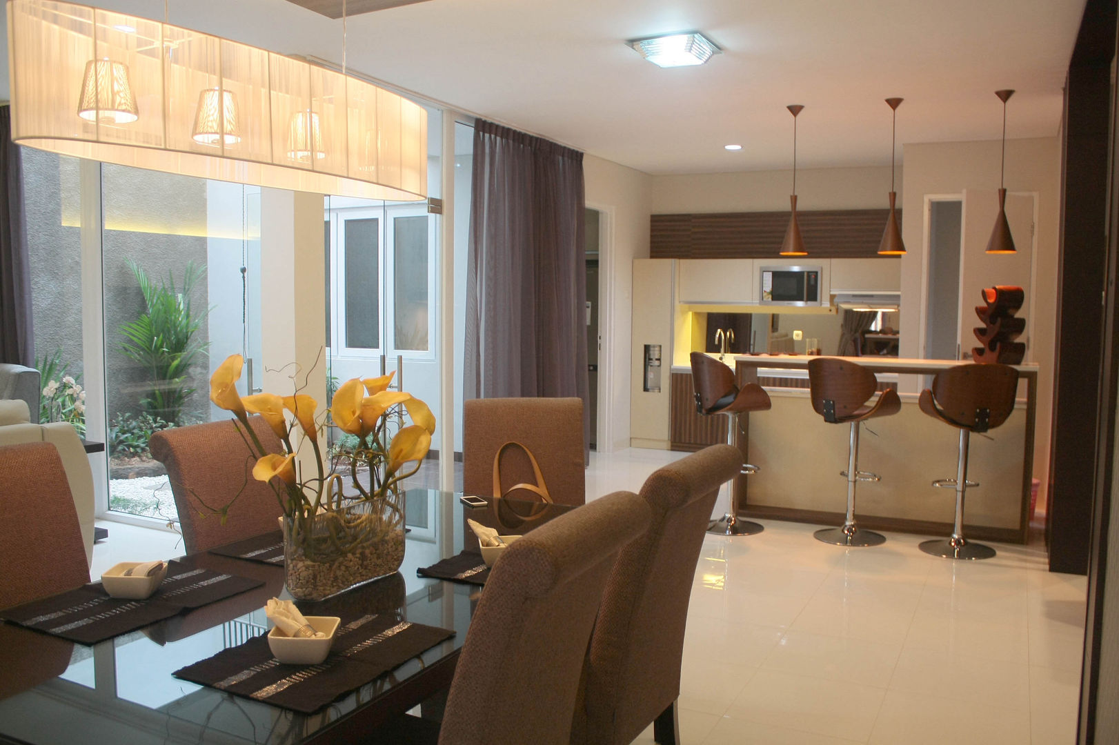 Rumah Raffles Hills Cibubur, Exxo interior Exxo interior Столовая комната в стиле модерн