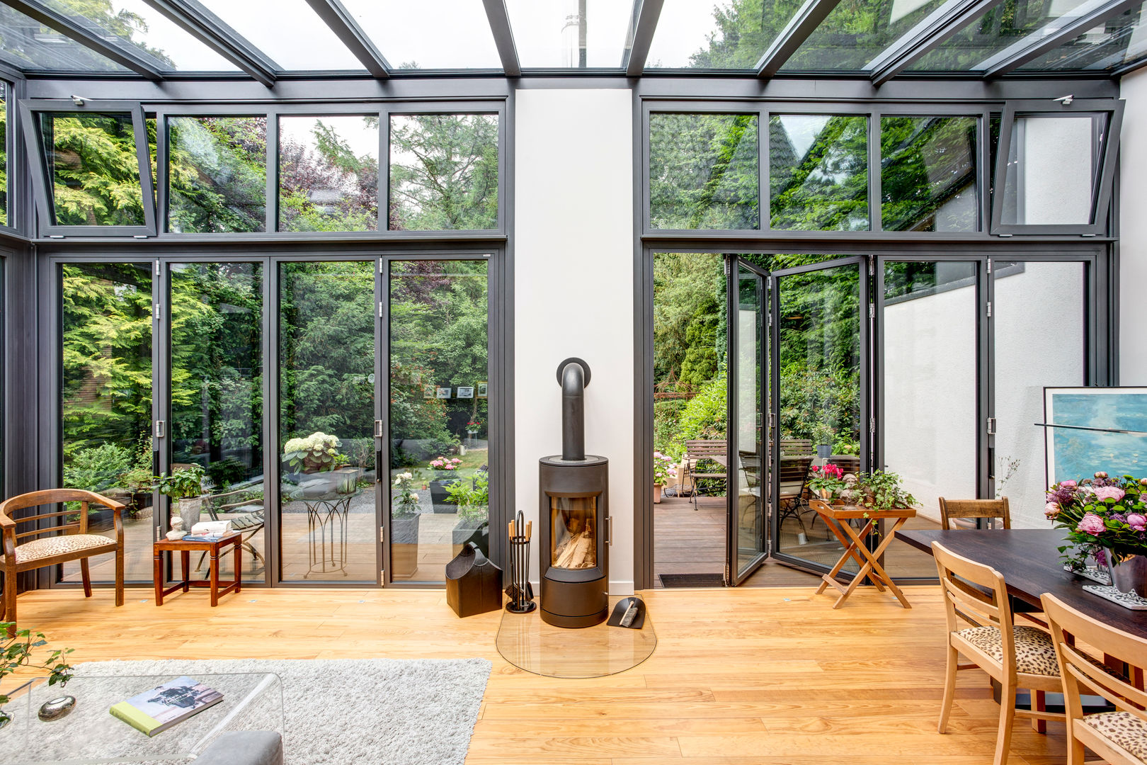 Wintergarten für ein Backsteinhaus, EMBERT Raumkonzept INNENARCHITEKTUR EMBERT Raumkonzept INNENARCHITEKTUR بيت زجاجي