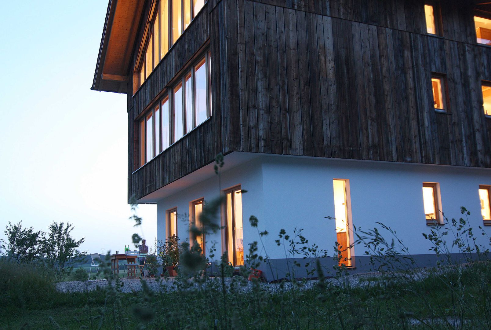 Gliederung des Baukörpers WSM ARCHITEKTEN Moderne Häuser Holzfassade,Holzverschalung,modernes Bauernhaus
