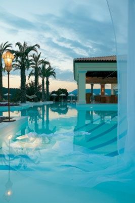 Soluzioni luminose SIRU per Eva Palace Grecotel Luxury Hotel, siru srl siru srl Piscinas de estilo ecléctico Vidrio