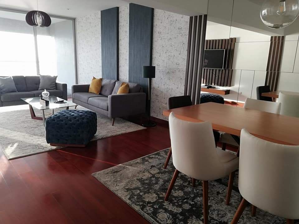 Departamento con vista espectacular al Malecon, Alicia Ibáñez Interior Design Alicia Ibáñez Interior Design ห้องนั่งเล่น