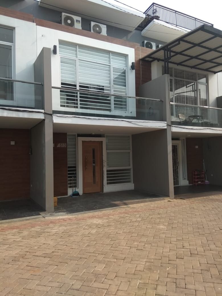 Renovasi Rumah - fasad homify Rumah Modern