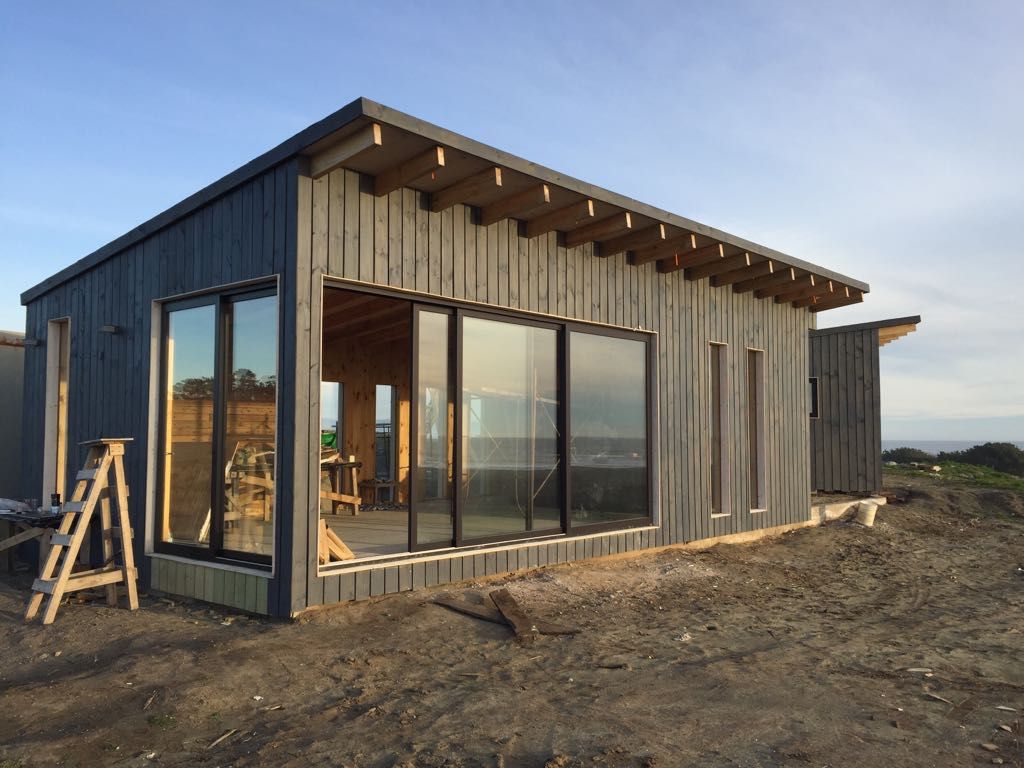 Cabaña en Santos del Mar, AtelierStudio AtelierStudio Wooden houses