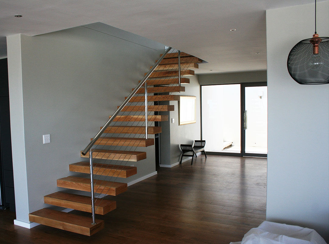 Heavy wooden staircase with aluminium handrails Renov8 CONSTRUCTION Stairs Metal