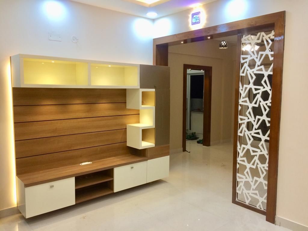 Mrs.Alifiya's Residence, Mahaveer Reviera, J.P.Nagar, Bangalore, Design Space Design Space Вітальня Фанера Підставки для телевізорів та шафи