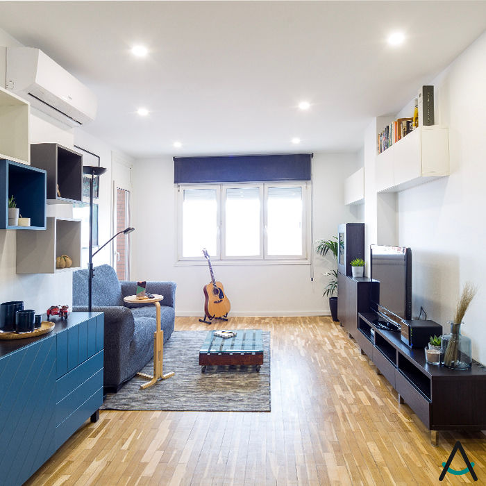 Proyecto de reforma e interiorismo en una vivienda en Barcelona por Estudi Aura, Estudi Aura, decoradores y diseñadores de interiores en Barcelona Estudi Aura, decoradores y diseñadores de interiores en Barcelona Modern living room Wood Wood effect