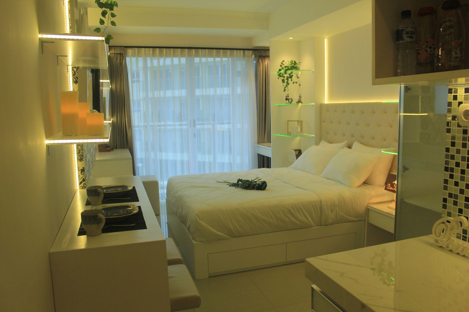 Gateway Diamond Apartemen, POWL Studio POWL Studio Tropical style bedroom Beds & headboards