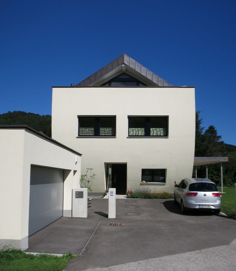 Westfassade archipur Architekten aus Wien Einfamilienhaus Ziegel Rundung