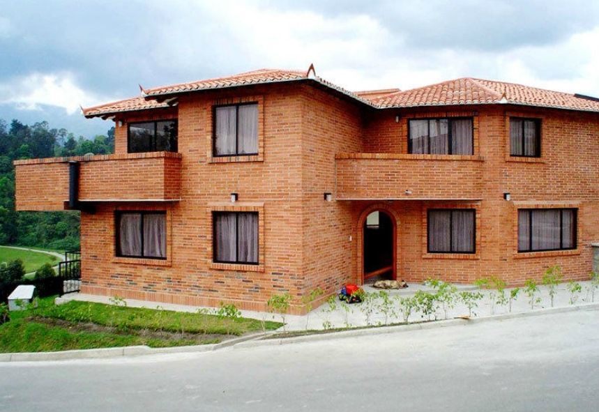 homify Casas de campo Ladrillos