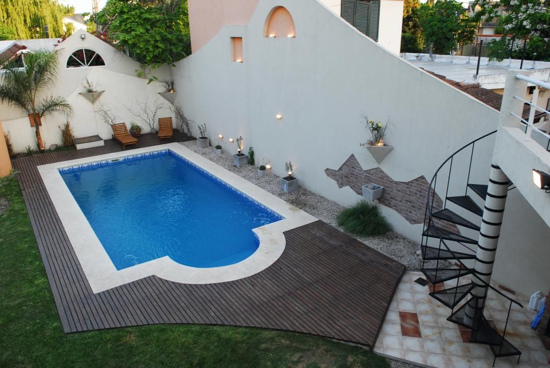 Casa AGC, Luis Barberis Arquitectos Luis Barberis Arquitectos Giardino con piscina