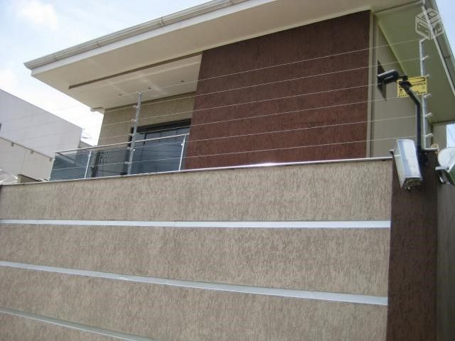 Aplicação de Grafiato em residência MIX COMPANY CONSTRUÇÕES E REFORMAS Casas familiares