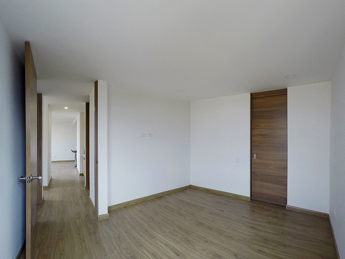 apartamento en Chia-Cundinamarca, TikTAK ARQUITECTOS TikTAK ARQUITECTOS 木製ドア