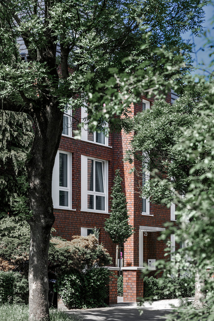 'Sechs Richtige' - Traditionelles Mehrfamilienhaus in Münster, mit 6 Wohneinheiten, Hilger Architekten Hilger Architekten Finestre in legno Legno Effetto legno